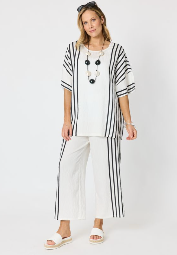 Sevilla Stripe Top — white and black striped short-sleeve top with a round neckline and small side splits | Sonella