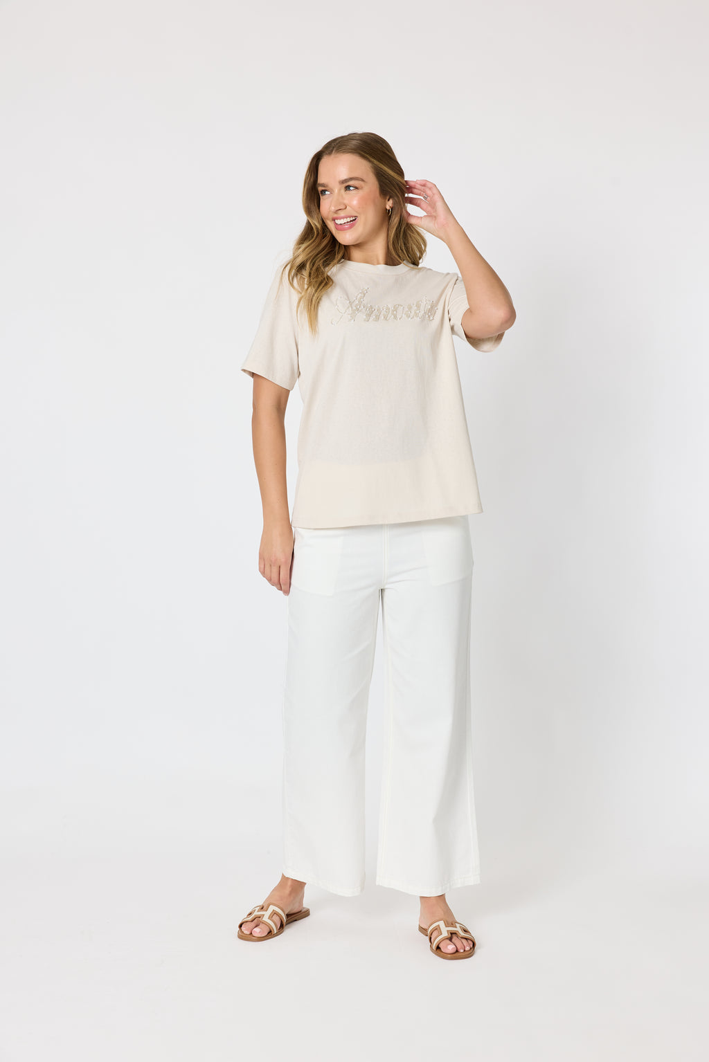 Coastal Wide Leg Jean – Milk — off-white wide-leg jean with brown contrast stitching and an elastic waistband | Sonella