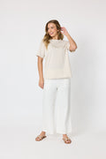 Coastal Wide Leg Jean – Milk — off-white wide-leg jean with brown contrast stitching and an elastic waistband | Sonella