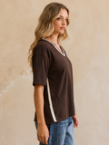 Street Mode Top — brown wool-blend short-sleeve top with white side stripes and a white V-neckline trim | Sonella