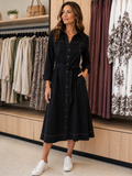 Detailed Stitch Dress — black and brown mid-calf dress with stitch detailing, long sleeves | Sonella
