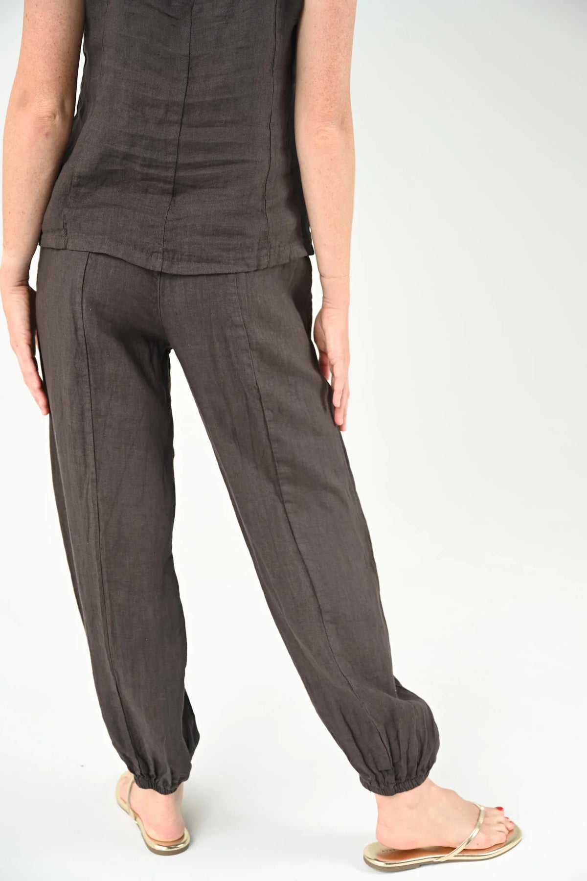 Meg 100% Linen Pant in chocolate – back view showing elasticated hem and defined seam detail | Sonella