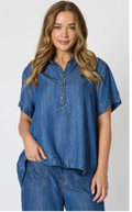 Dune Shirt — washed-denim-tone cotton shirt with a half-button front, high-front low-back hem and stitch detail | Sonella