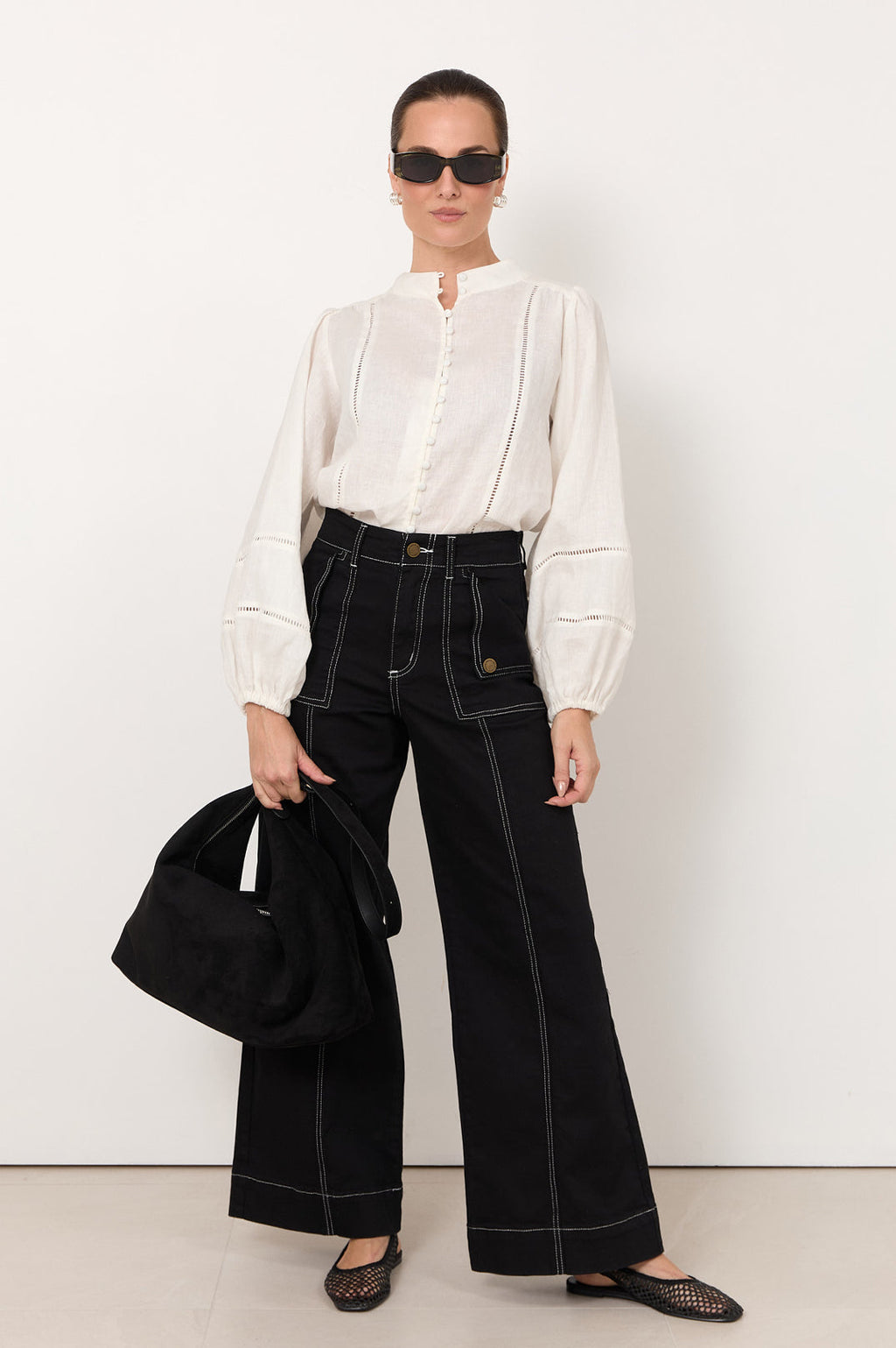 Dion Statement Pocket Jean in black – styled view showcasing statement pocket design | Sonella