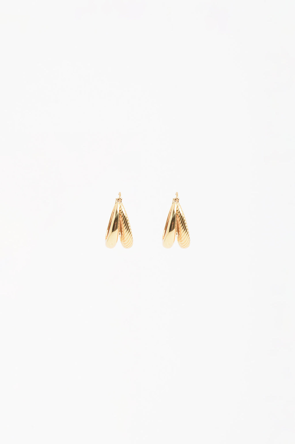 Oval Braid Detail Double Hoop Earrings in gold plated metal – styled view showing double hoop silhouette | Sonella
