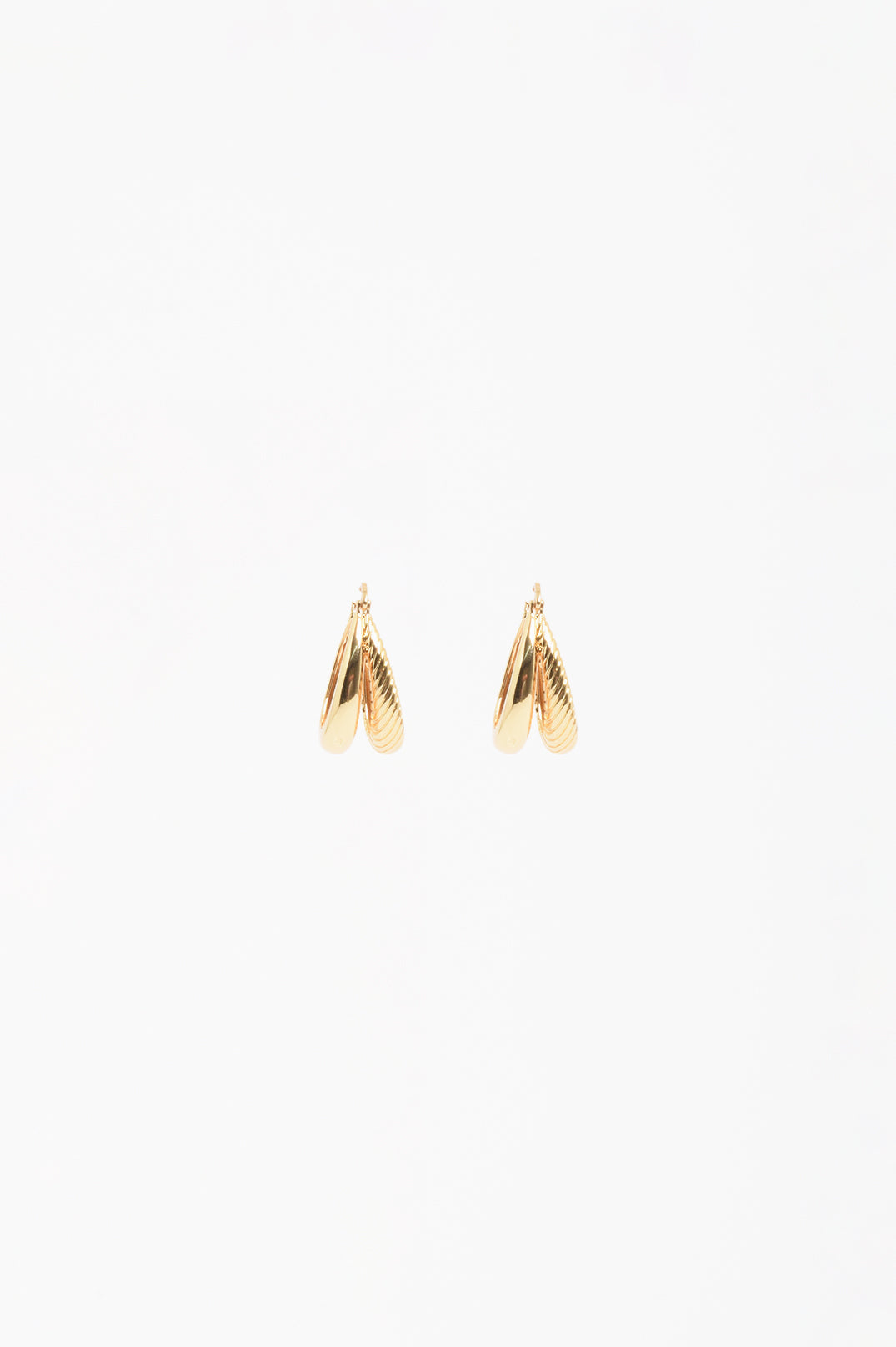 Oval Braid Detail Double Hoop Earrings in gold plated metal – styled view showing double hoop silhouette | Sonella