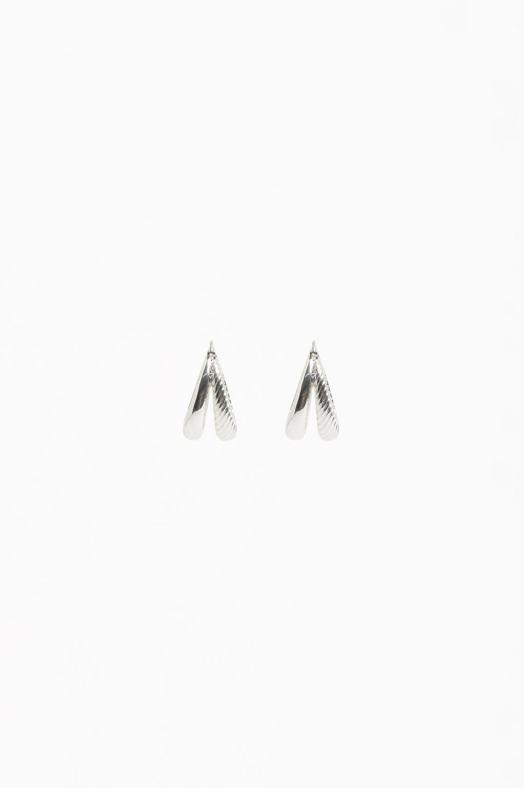Oval Braid Detail Double Hoop Earrings in silver plated metal – close-up of braid detail and oval hoop design | Sonella