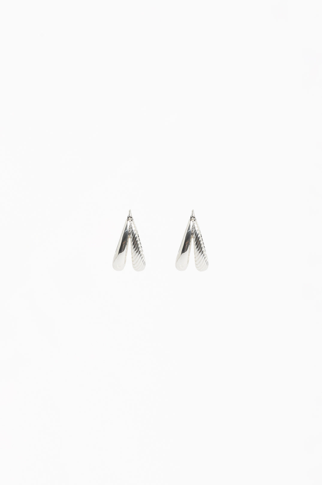 Oval Braid Detail Double Hoop Earrings in silver plated metal – close-up of braid detail and oval hoop design | Sonella